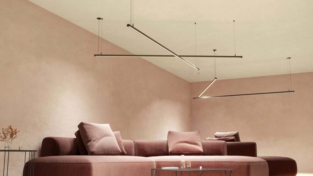 Soggiorno con il sistema lineare Beneito Faure Evo sospeso a soffitto
