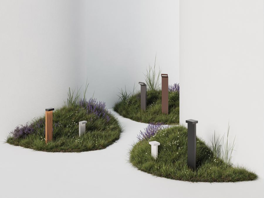 Paletti Luce&Light Plin in un giardino con la ghiaia