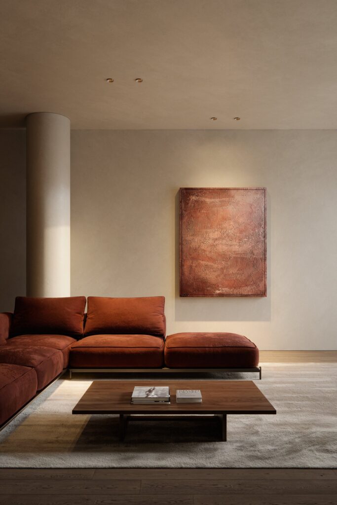 Soggiorno con il divano arancione e gli incassi Modular Kup a soffitto
